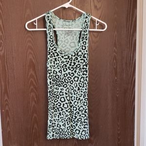 Any item from my closet with a🌹is 5 for $20! Blue leopard Tank Top